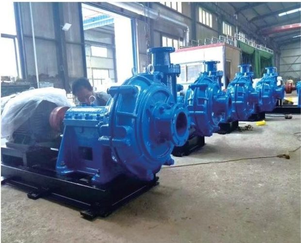 Assembled slurry pumps lined up in the assembly bay